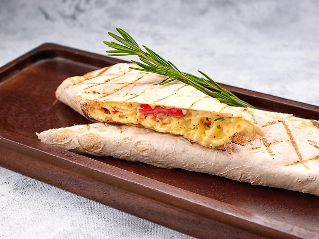 Lavash roll with suluguni cheese and tomatoes