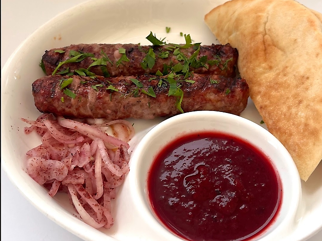 Lamb kebab with pita and sauce