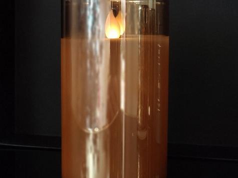 Свеча электронная в  золотом цилиндре 10х12,5см