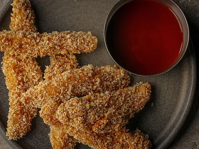 Курячі нагетси з соусом BBQ