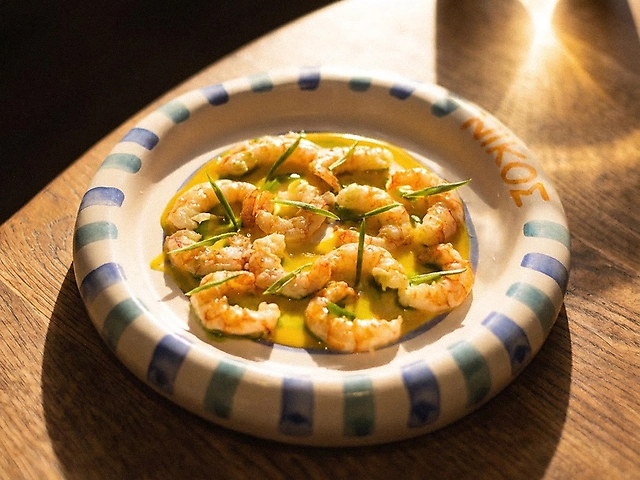 Лангустини  саганакі з соусом лимонакі