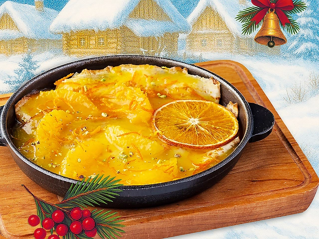 Млинці з апельсинами  та апельсиновим соусом