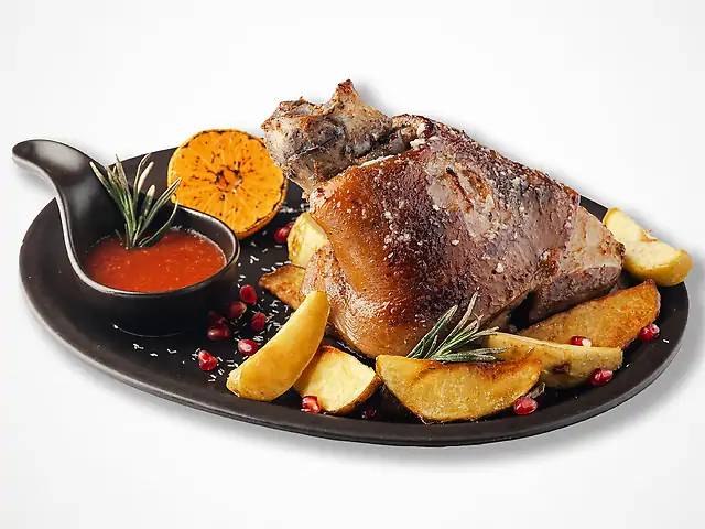 Запечена Рулька свинини з часником