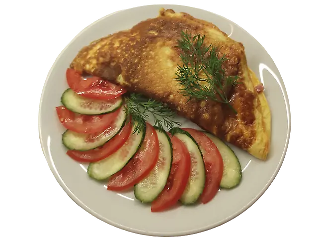 Гарячий сендвіч у яйці з шинкою та сиром