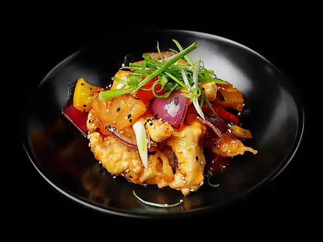 Pork with pineapples and vegetables