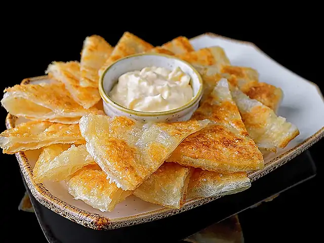 Chapati with cheese sauce