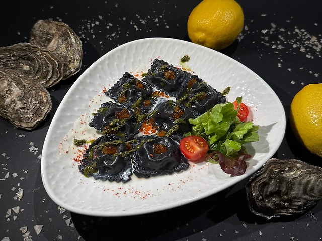 Фірмові равіолі з раковими шийками