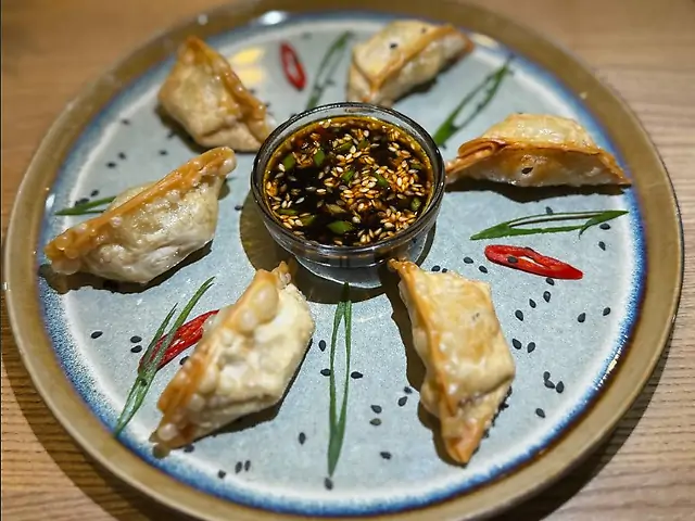 Гіоза зі свининою  кім-чі