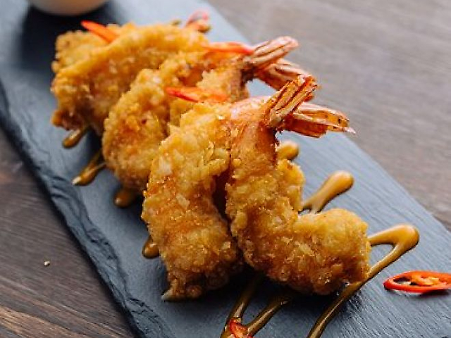 Тигрові креветки в сухарях Панко