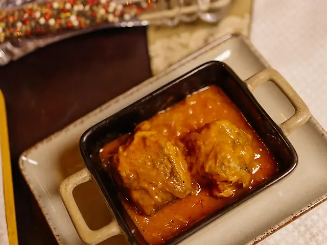 Хек в томаті