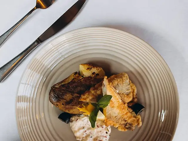 Хек з картоплею