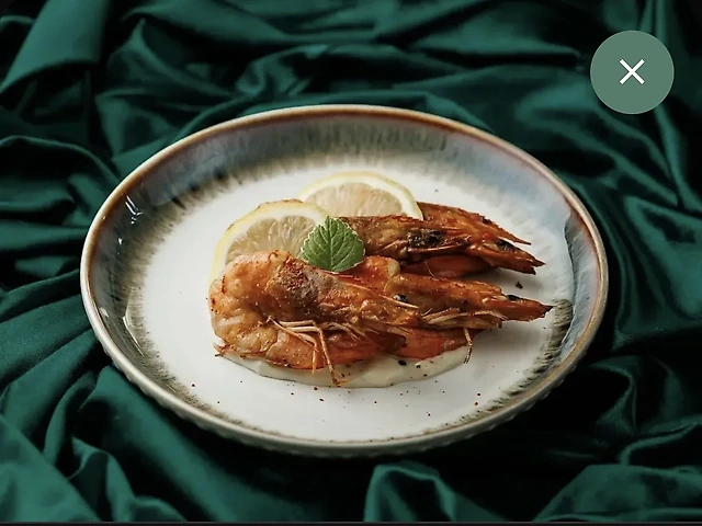 Креветка з головою на грилі