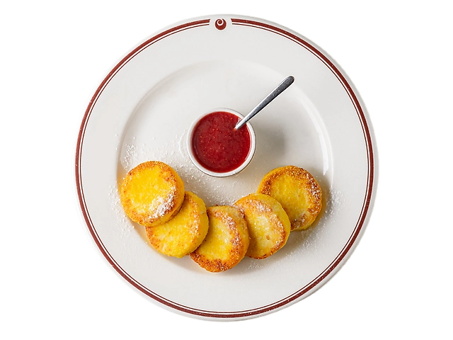 Сирники з соусом та сметаною