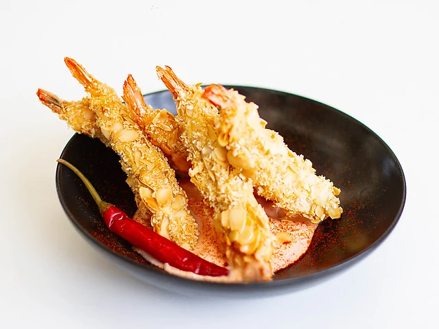 Креветки в гостро-вершковому соусі