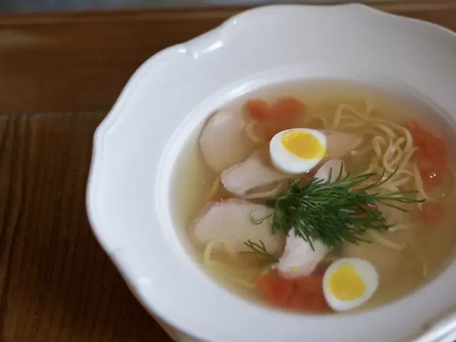 Chicken broth with noodles and chicken