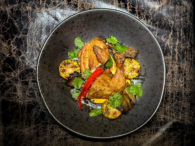 Половина курча з кукурудзою