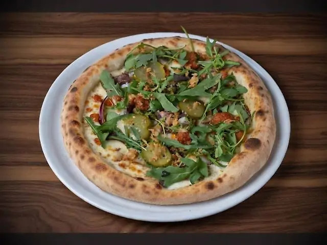 Піца з томленою телятиною та руколою