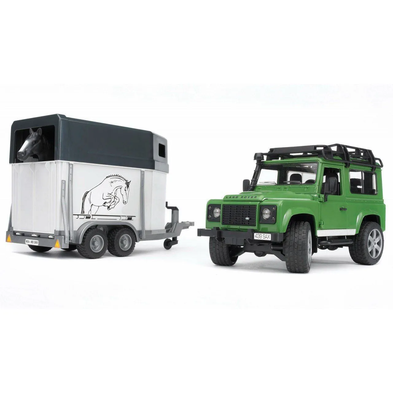 Набір іграшковий. Автомобіль Land Rover Defender з трейлером для перевезення коней та кінь