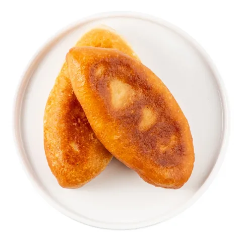 Пиріжки смажені з капустою ваг. Кулінар.